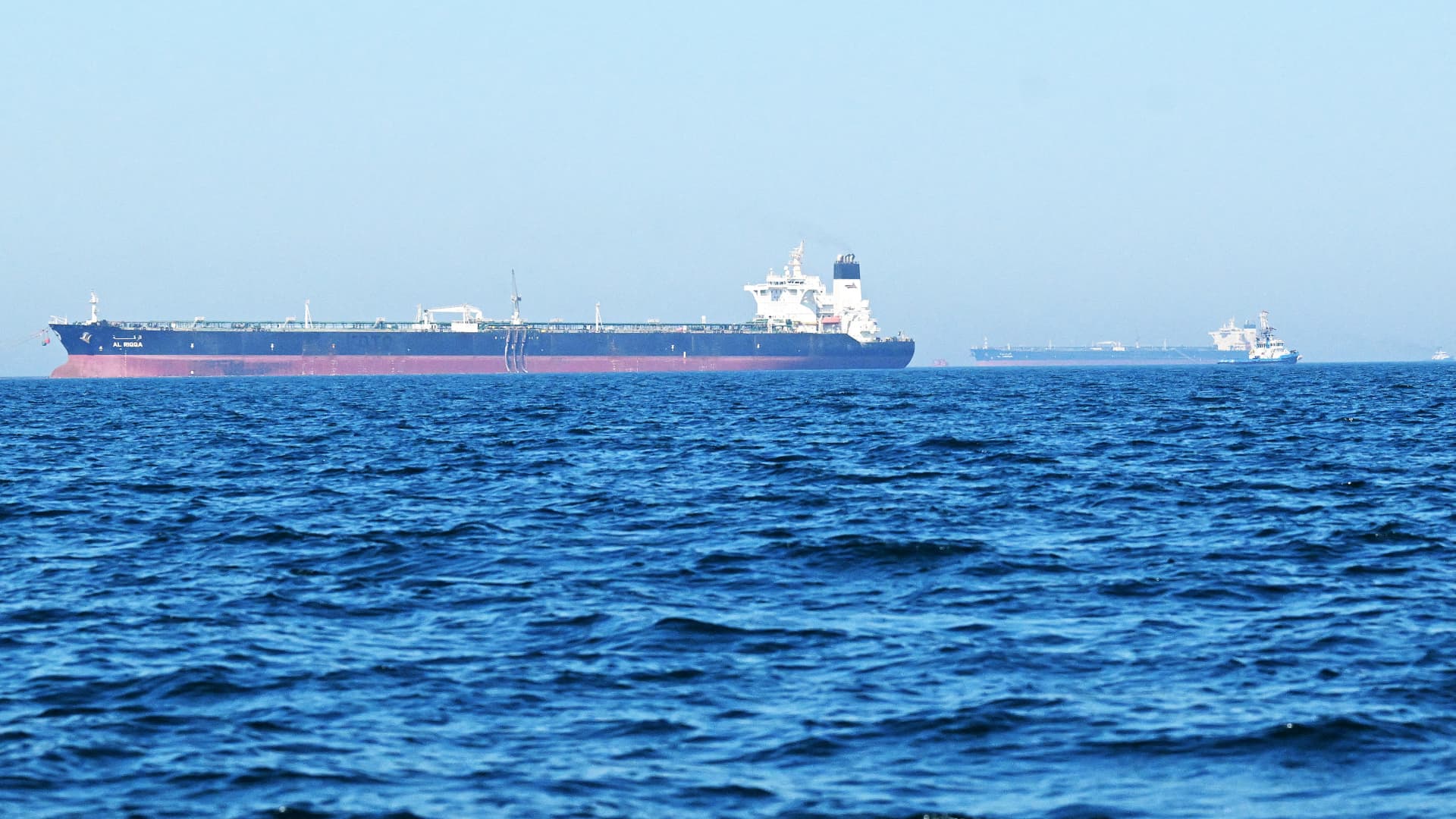 Oil prices fall as investors weigh falling demand against Middle East tensions