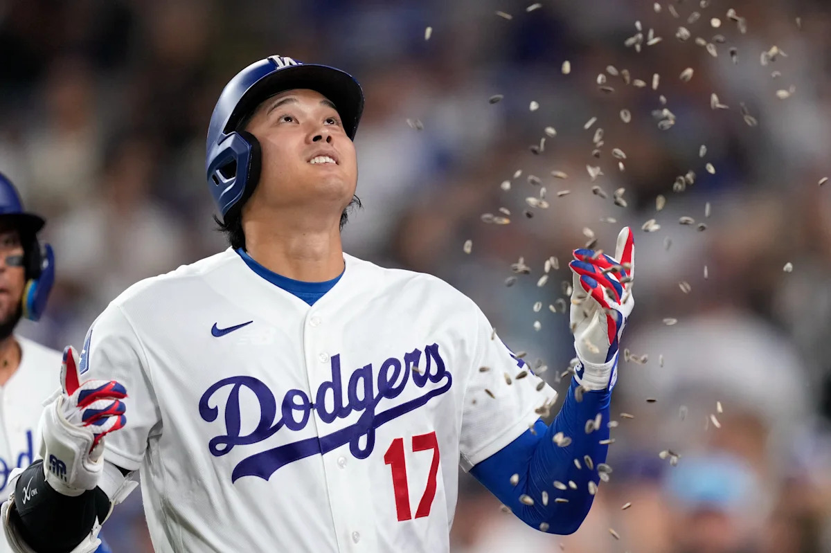 Homers from Ohtani and Betts power Dodgers to a 4-2 victory and a sweep of the Royals