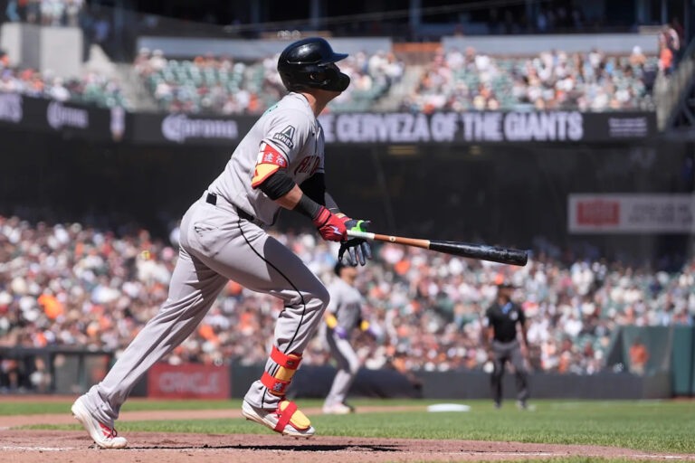 Nootbaar hits pinch grand slam in 7th to back Kelly in Diamondbacks' 7-1 win over Giants