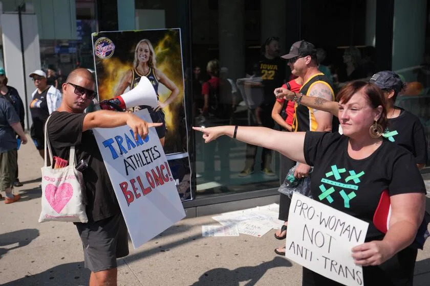 Commentary: A culture war over trans athletes invades the WNBA, and ratings soar