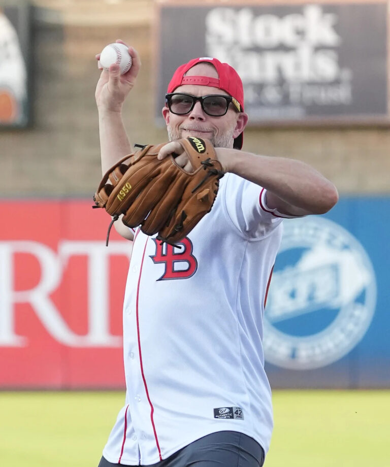 Louisville's Pat Kelsey throws first pitch on bobblehead night at Bats game