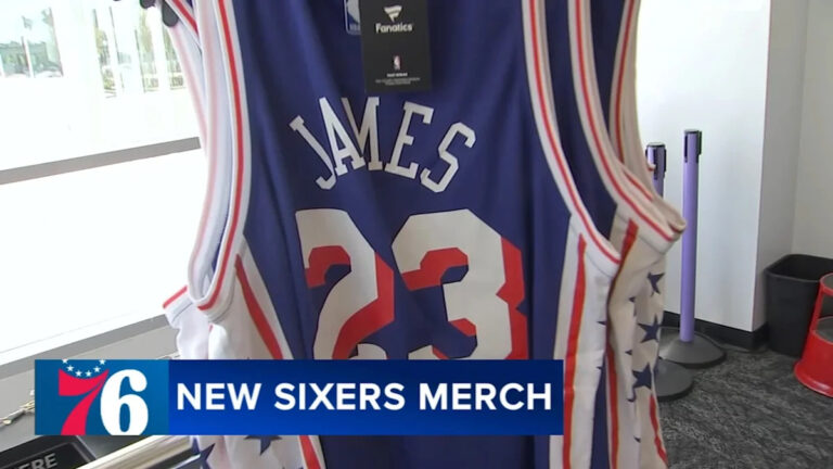 Fans line up for chance to buy LeBron James 76ers jerseys at special team store opening