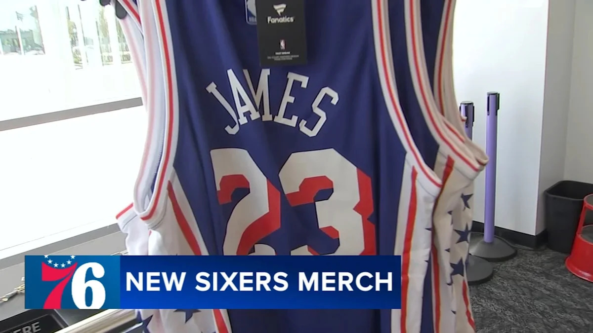 Fans line up for chance to buy LeBron James 76ers jerseys at special team store opening