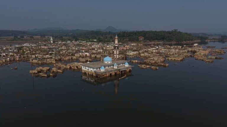 Submerged Indonesian village re-emerges as drought lowers water levels