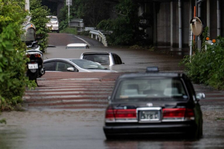 Record-breaking rain in Japan leaves several dead, thousands stranded