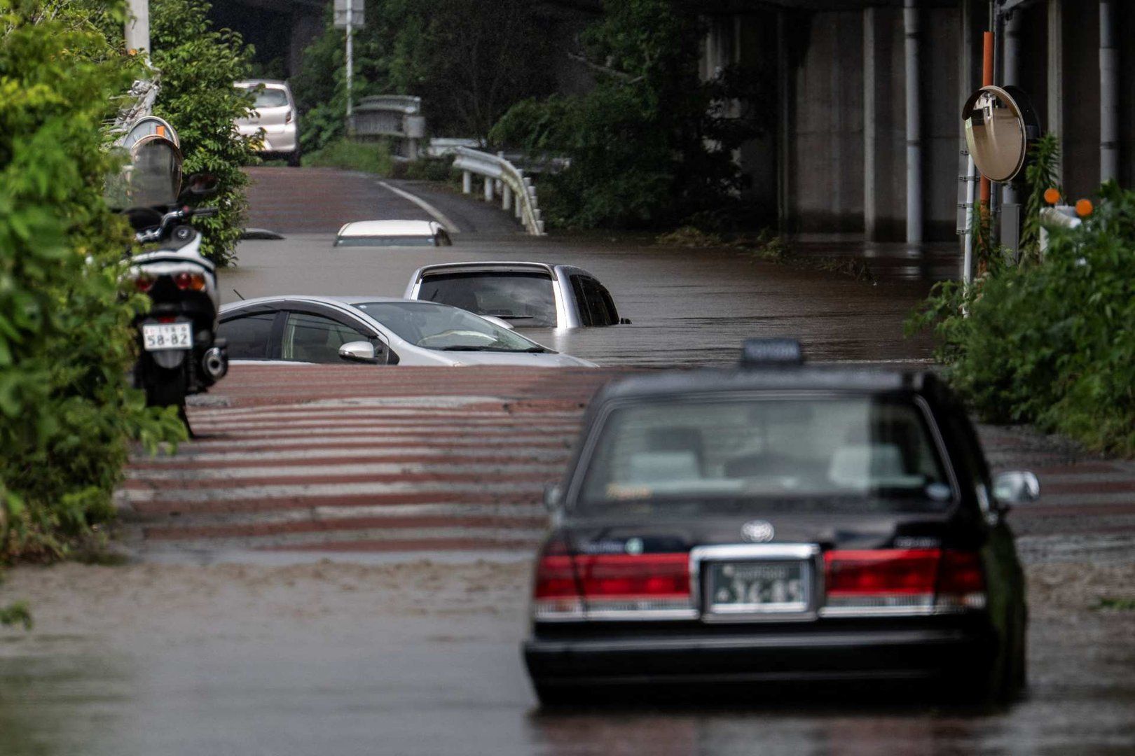 Record-breaking rain in Japan leaves several dead, thousands stranded